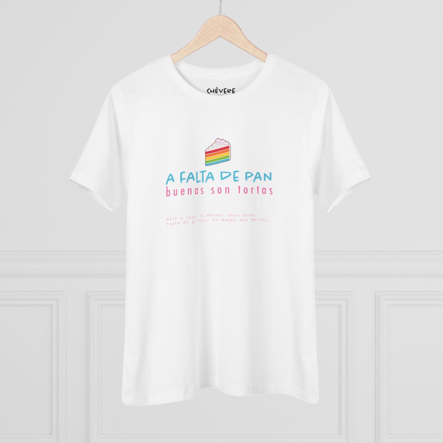 Women's Tee — 'A Falta de Pan, Buenas Son Tortas' Rainbow Cake Graphic